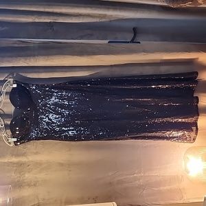 Black strapless sequin gown. Non lined size 8. New